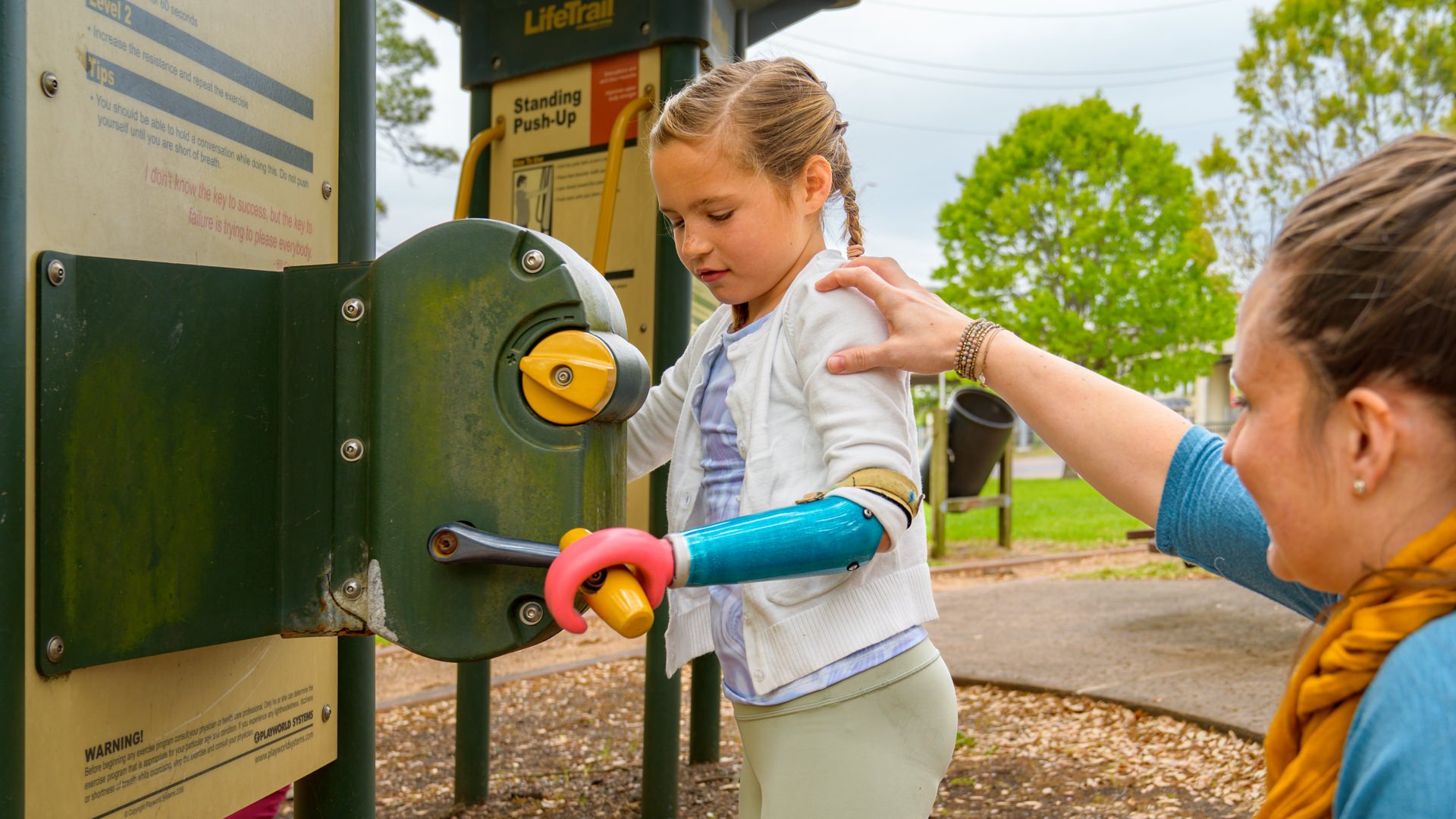 An Arm Dynamics Clinical Therapy Specialist works with congenital pediatric patient Autumn Egnatuk while using her activity-specific prosthesis -1