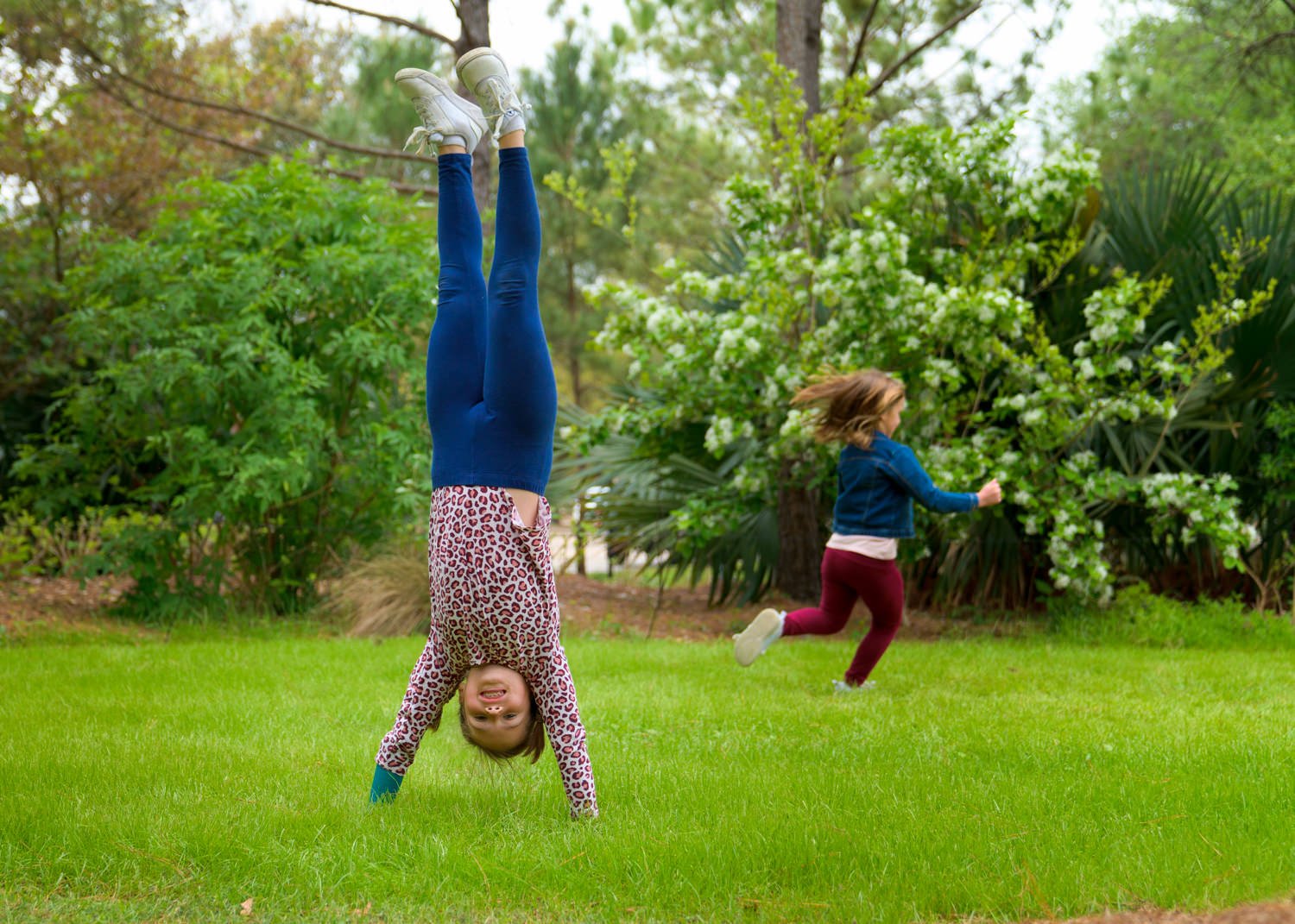 Autumn does a hand stand using her Activity-Specific Shroom Tumbler Device