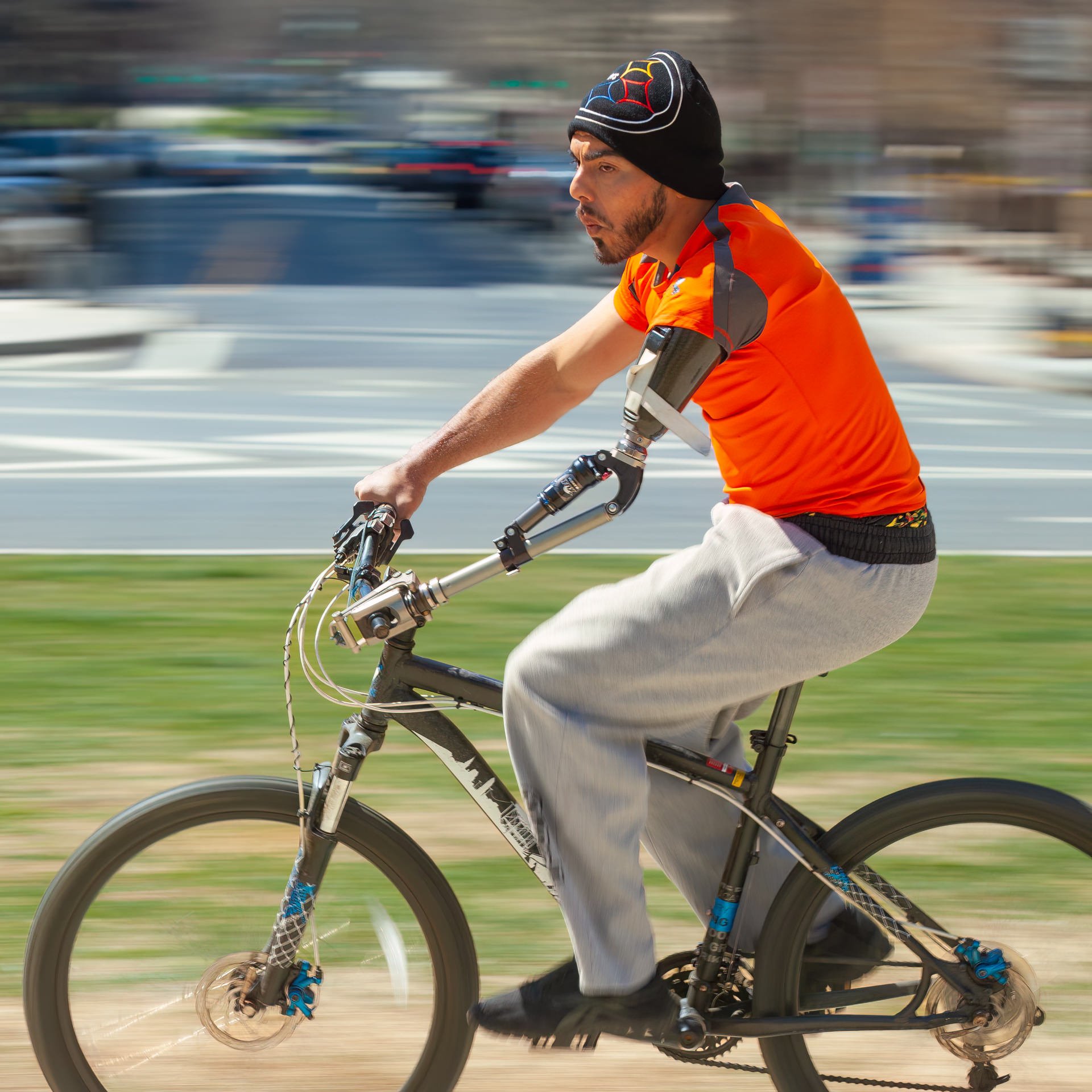 Staff Sgt. Michael Kacer (RET) on his bike in Washington, DC with his custom activity-specific prosthesis