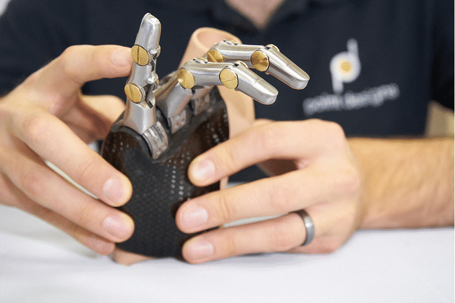 Wooden prosthetic hand with rigid fingers